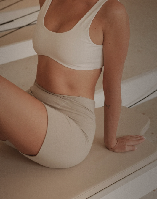 A fit woman doing pilates